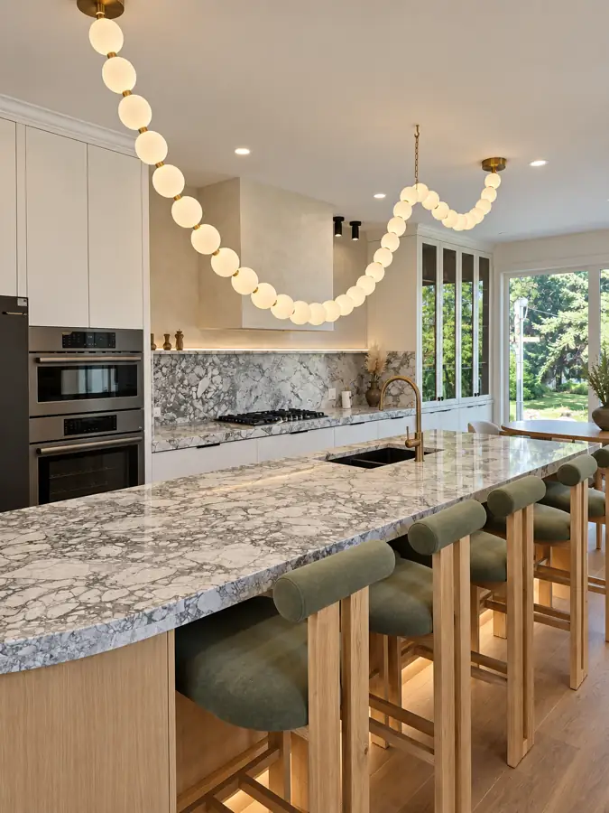 Kitchen: Island end, the stools and the ceiling piece