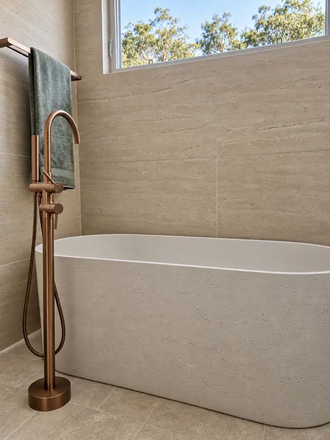 Bathrooms: The tub against the wall tile