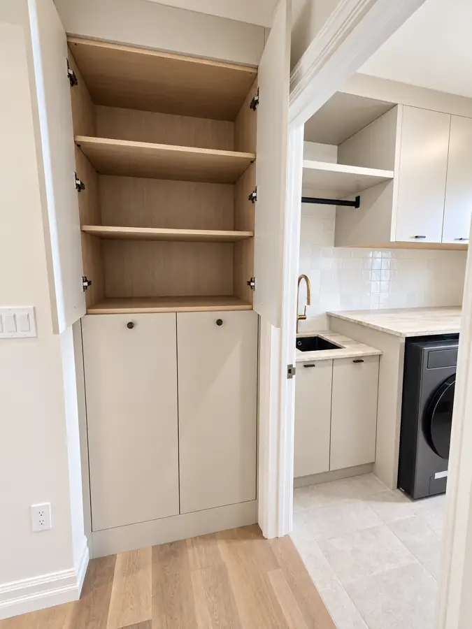 Laundry and bonus room: Tall utility run, doors open