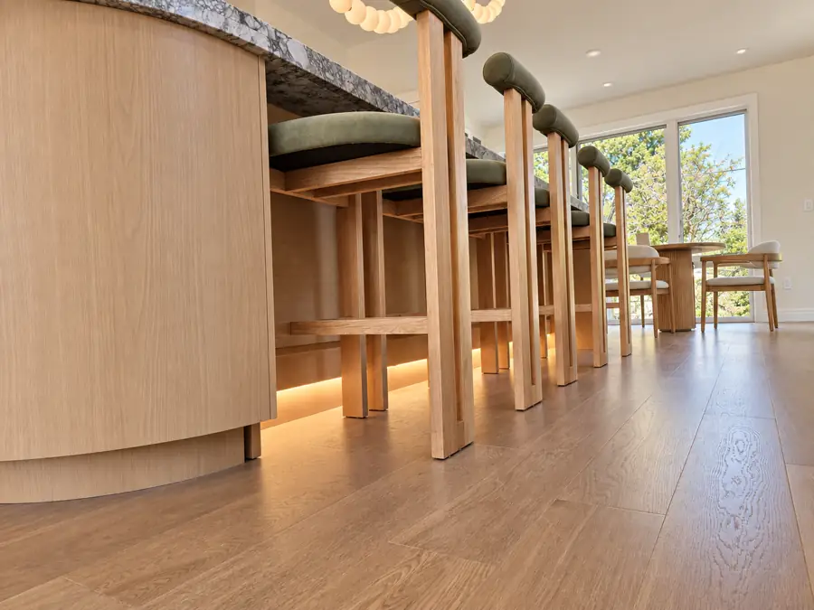Kitchen: Under the island: oak, stone and the light line
