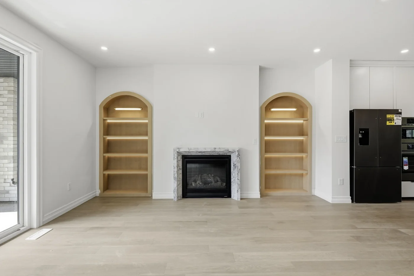 Arched bookcases installed
